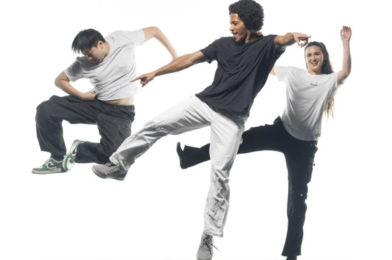 dancers in front of white background