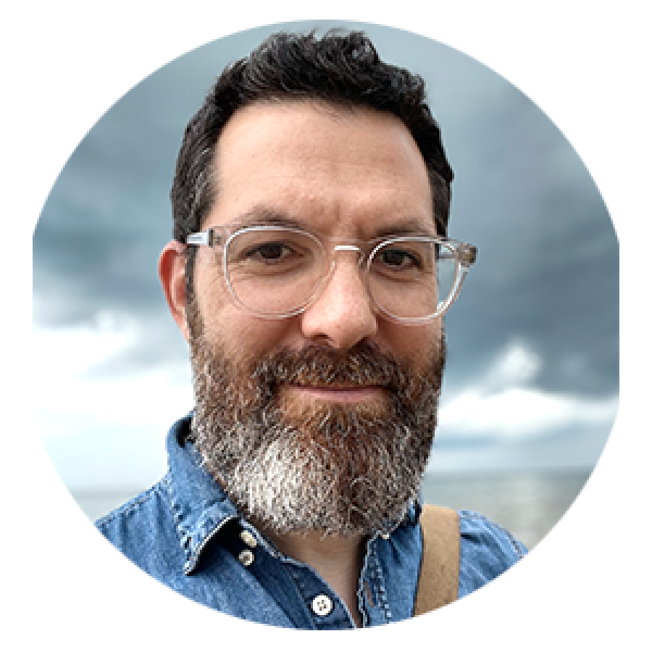 middle aged white man with glasses and a salt and pepper beard